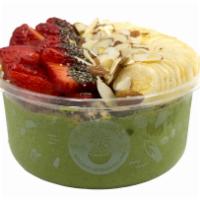 Pacific Green Bowl · Green bowl blended with kale, pineapple, banana and coconut milk topped with granola, strawb...