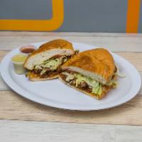 Torta Lunch · Choice of meat, lettuce, tomato, avocado, sour cream cheese and refried beans on fresh torta...
