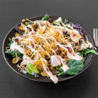 Zozobra Spicy Salad · Hot grilled chicken, corn, black beans served on mixed greens with onion, salsa, tortilla ch...