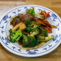 5. Hunan Beef · Choice flank strip sauteed separated with seasoned vegetable in hot sauce. Spicy.