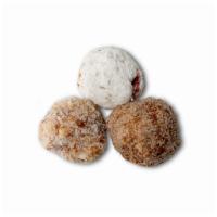 Cronies · Mini version of our doughnuts. Comes with cinnamon sugar, raspberry filled or coconut cream ...