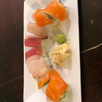 Rainbow Roll · Inside: crab and avocado. Outside: tuna, salmon, yellowtail and with fish.