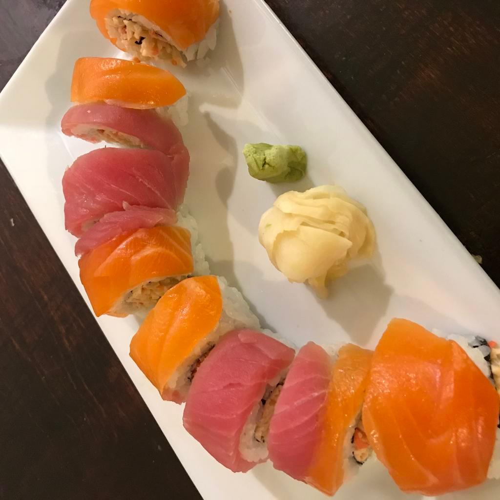 Camellia Roll · Inside: crab, fish roe and mayo. Outside: tuna and salmon.