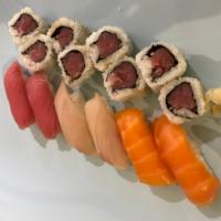 Sushi Assorted · 2 salmon, 2 tuna, 2 yellowtail, and choice of Spicy tuna roll or California roll.