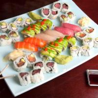 Sushi for 2 · 1 dragon roll, 1 Alaska roll, 1 tuna roll, 1 California roll, 2 salmon, 2 tuna and 2 yellowt...