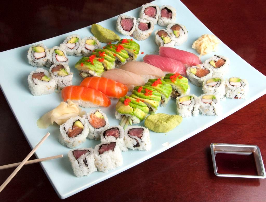 Sushi for 2 · 1 dragon roll, 1 Alaska roll, 1 tuna roll, 1 California roll, 2 salmon, 2 tuna and 2 yellowtail.