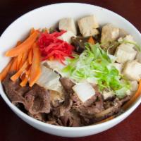 Sukiyaki Don · Beef and veggies over rice.