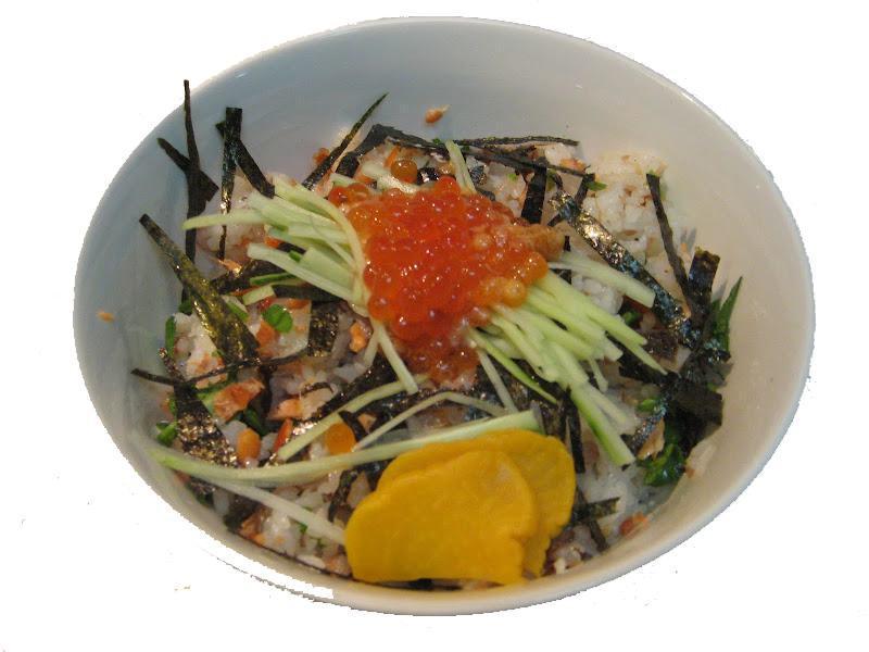 Salmon Skin don · Broiled salmon skin mix with rice, cucumber and salmon roe on top