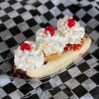 Banana Split Sundae · Our banana split is made with one scoop of vanilla ice cream topped with pineapple, chocolat...