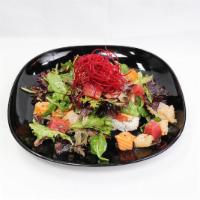 Forest Heaven Roll · Sashimi salad over spicy tuna and crab roll.
