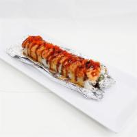 Baked Salmon Roll · Baked salmon over a California roll.