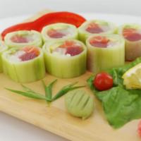 Oishi Roll · Yellowtail, tuna, salmon, shrimp, crab and mango with cucumber wrap.