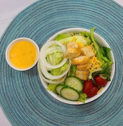 Side House Salad · Mix, tomatoes, onions, cucumbers, croutons and shredded cheddar cheese. Add bacon for an additional charge.
