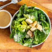 Side Caesar Salad · Green salad with Caesar dressing and cheese. 
