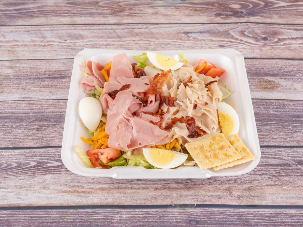 Chef Salad with Ham and Turkey Lunch Special · Lettuce, tomato, cheese, ham and turkey.
