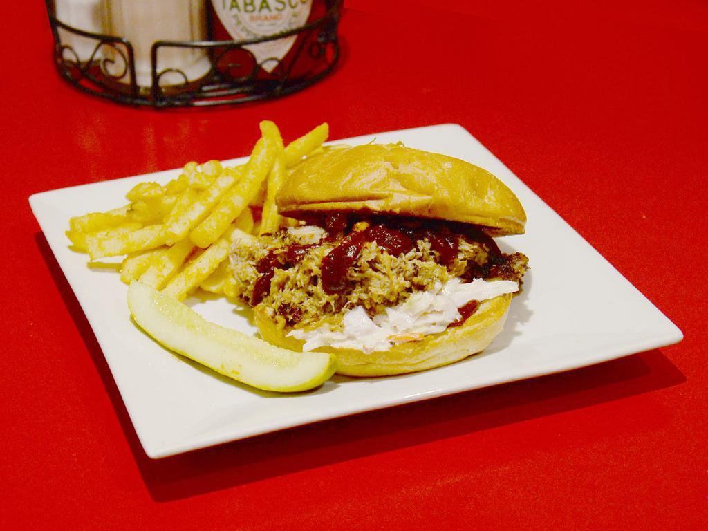 Pulled Pork Sandwich · Served on a fresh kaiser roll with barbecue sauce & coleslaw. Served with a pickle and your choice of side: Waffle friess, fries, tater tots, coleslaw or potato salad
