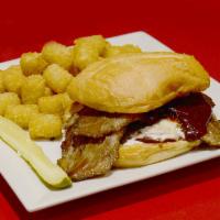 Brisket Sandwich · Served on a fresh kaiser roll with barbecue sauce, & coleslaw. Served with a pickle and your...
