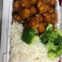 General Tso's Chicken · Served with white rice. Made with write meat.

