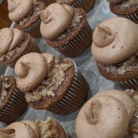 German Chocolate Cupcake · German Chocolate Cake with Coconut Pecan filling topped with Chocolate Buttercream