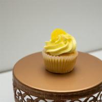 Lemon Twist Cupcake · Lemon Cake with Lemon Buttercream topped with Lemon Candy