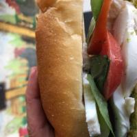 Caprese Sandwich · Fresh mozzarella, tomato, olive oil, basil pesto, and basil.