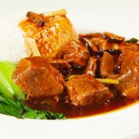 Tangy Beef Stew with Rice  · Served with white rice and braised egg. 