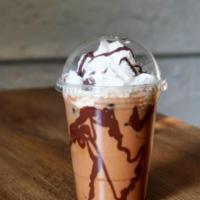 Iced Nutella Peanut Butter Latte · Iced latte with nutella and peanut butter with whipped cream.