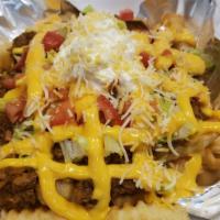 Papas Locas -- Mami's Loaded Plate · Loaded French fries with 3 meats (Pulled pork, Ground Beef, and Chicken in a mustard, ketchu...