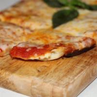 Margherita Flatbread · Tomato, fresh mozzarella cheese and basil. 