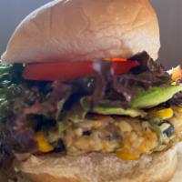 Spicy Southwest Burger with Avocado · Delicious spicy patty from black beans, jalapeño, brown rice, corn, vegan cheese, spices & s...