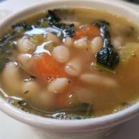 Tuscan White Bean Soup · With organic carrot, organic celery, organic dinosaur kale, fresh herbs and seasoning. Serve...
