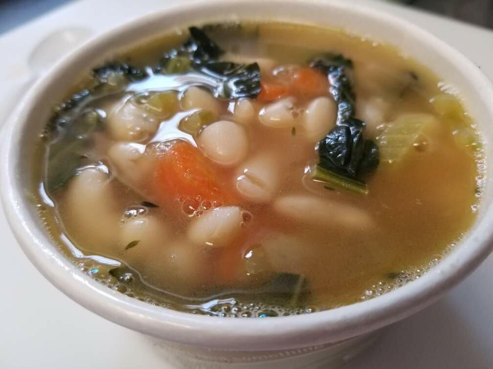 Tuscan White Bean Soup · With organic carrot, organic celery, organic dinosaur kale, fresh herbs and seasoning. Served with oyster crackers. 16oz.