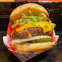 The Broadway Burger · 6oz pub-style cheeseburger with lettuce, tomato, onions, pickles, special sauce