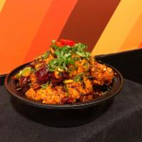 VEGETARIAN Mala Popcorn Chicken  · Tempura-battered fried vegetarian chicken, tossed in house chili oil with Sichuan spice mix ...
