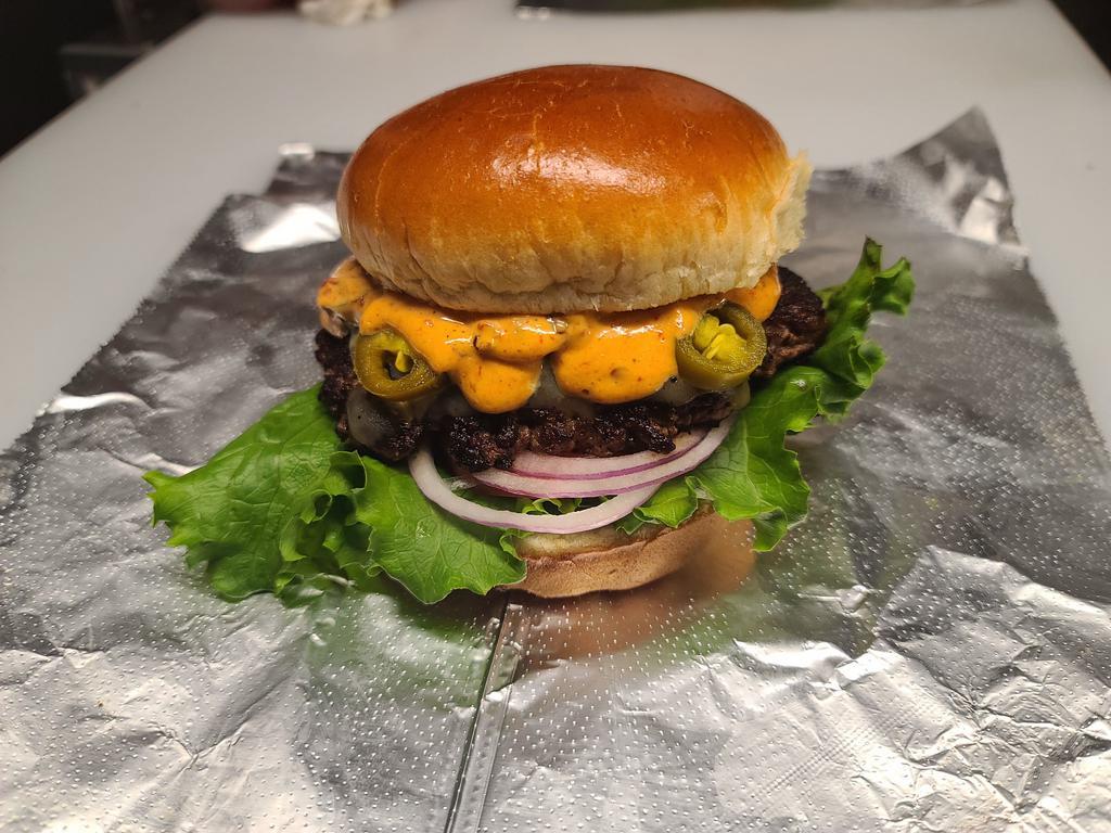 Burn Card Burger (Fire Burger) · Fire. brioche bun, lettuce, tomato, red onion, pepper jack cheese, jalapenos and Chipotle Aioli. 
