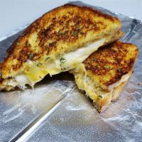 4 of a Kind (4 Cheese Grilled Cheese) · Four cheese. Grilled cheese, American cheese, pepper jack cheese, Swiss cheese, and mozzarel...