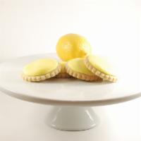 Lemon Creme Cookie · Does love lemon stand freshness?  Well, an image that in a buttercream frosting on a hand ma...