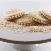 Coconut Creme Cookie · Our Signature cookie topped with coconut buttercream frosting and sprinkled with toasted coc...