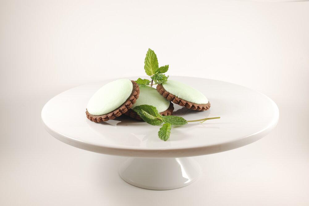 Chocolate Mint Cookies · Delicious and moist chocolate cookie topped with a mint flavor buttercream icing.