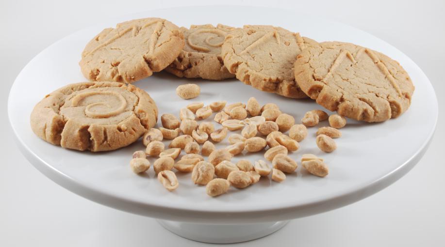 Peanut Butter Peak · Our Peanut Butter Peak cookie is an old classic.  But this is a gourmet peanut butter cookie.  Made with only fresh ingredients and the best peanut butter, it is very delicious with a rick pea-nutty taste and smooth buttery texture.  We also add freshly chopped peanuts.  They come in a 12ct box.
