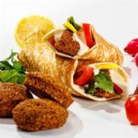 Falafel Saj · Falafel, Lettuce,tomato, pickles, hummus,onions