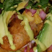 Hurricane Fish Taco · Fried battered cod served on a bed of a bed of our homemade coleslaw. Topped with habanero o...