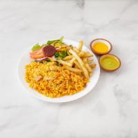 Arroz con Pollo · Mixed rice with chicken, french fries and salad.