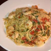 Sauteed Linguine pasta with Shrimps · Sauteed linguine pasta with tomatoes, shrimp, and green onions.
