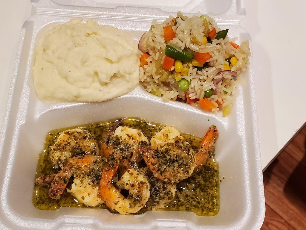 Herb Shrimp · 5 jumbo shrimp steamed in a sweet herb sauce, and served with 2 sides of your choice.