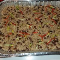 Rice & Peas · Rice and peas cooked in a seasoned coconut milk.