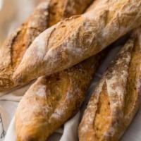 She Wolf Baguette  · The dough is a mix of roller-milled white and stone-milled flour. Its hallmarks of excellenc...