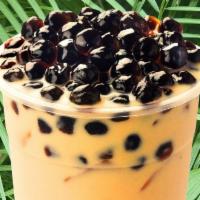 Mango Milk Tea · Creamy, refreshing mango milk tea with natural sweetness from fresh mangos topped with tapio...