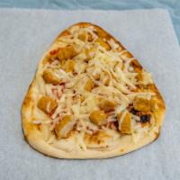 Chicken Tikka Naan Pizza · This naan pizza has our signature tikka sauce, chicken tikka kabab and mozzarella cheese.