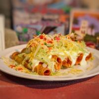 Tacos (3 Roll) · Served with chicken, guacamole, cheese, lettuce, pico de gallo, sour cream.